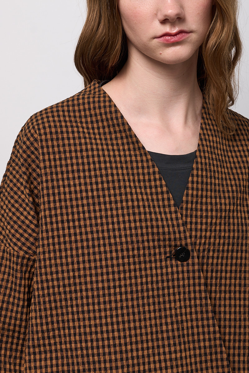 GIACCA ASIMMETRICA CON UNA TASCA